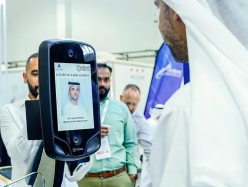 Biometric data is used at e-gates at Abu Dhabi airport, but passengers must still present their passports