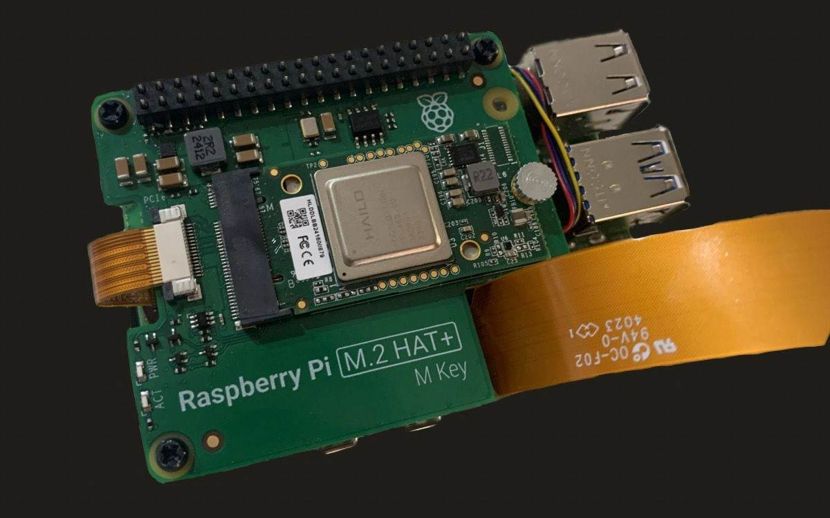 Step 7: Use the four remaining screws to secure AI Kit in place.