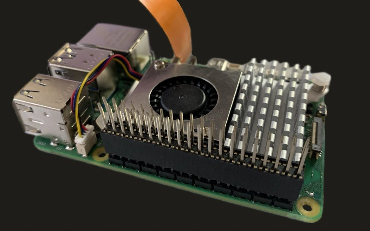 Step 3: Press the GPIO stacking header on top of the Raspberry Pi GPIO pins. Its orientation doesn't matter.